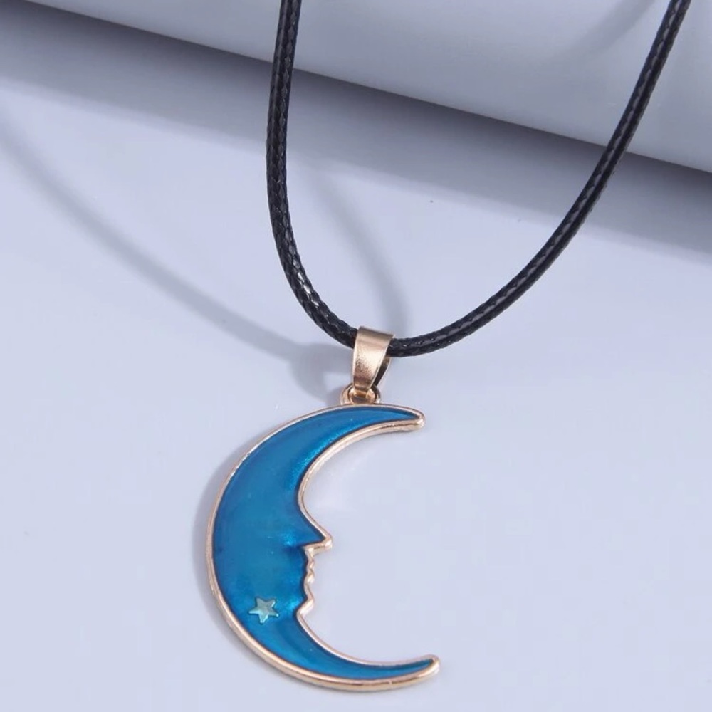 Celestial Moon Face Pendant Necklace โ Blue Crescent Charm on Black Cord - Picture 1 of 5